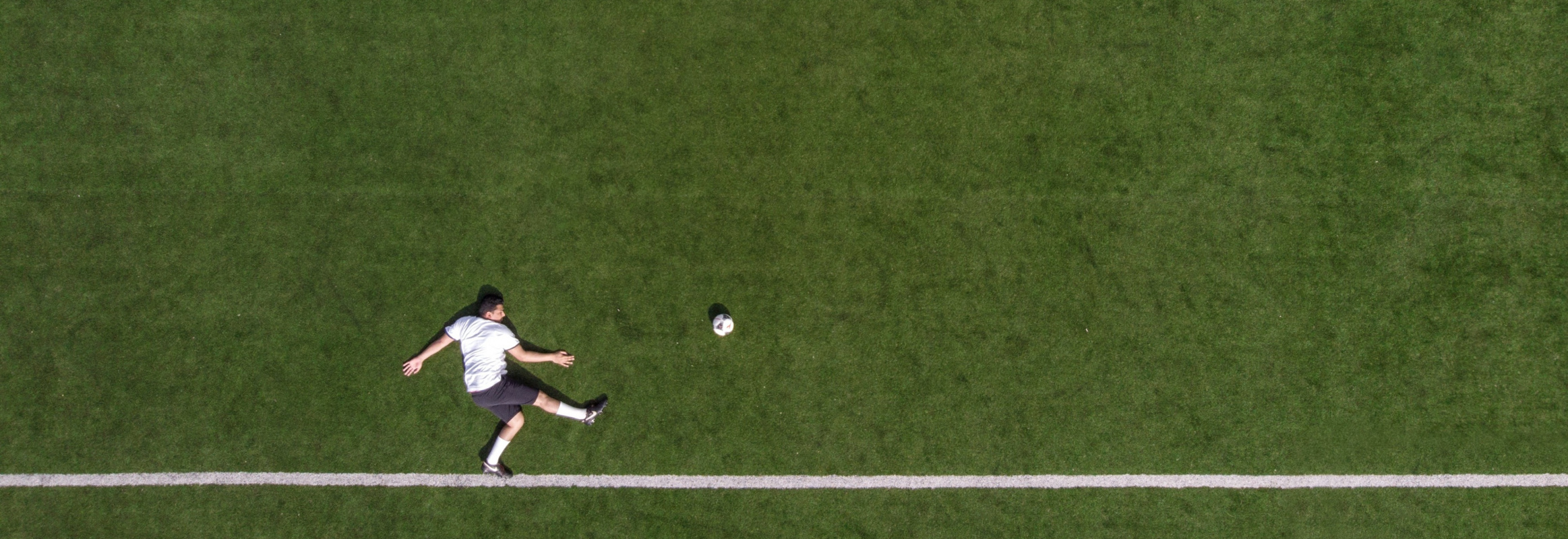 Drone Birds Eye Photo Of Striker Kicking
